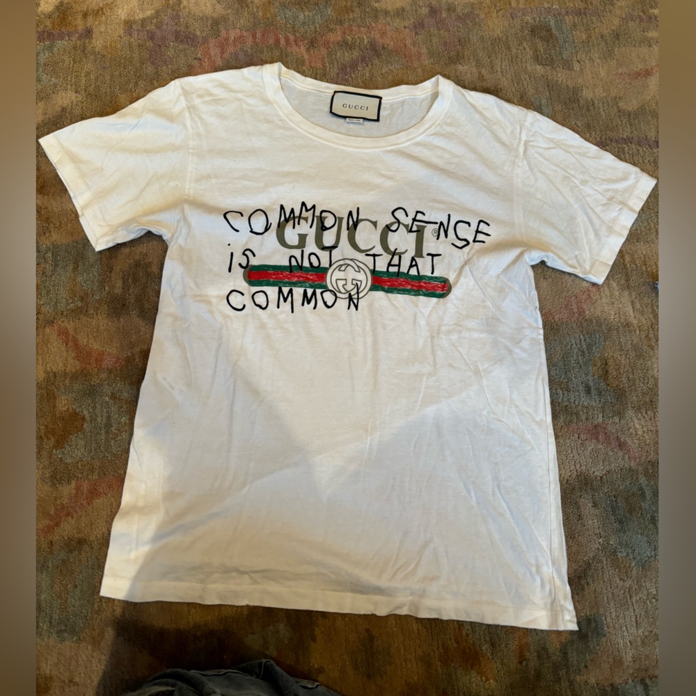 Gucci “common sense is not that common” tee